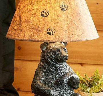 Sitting Black Bear and Paw Print Online now